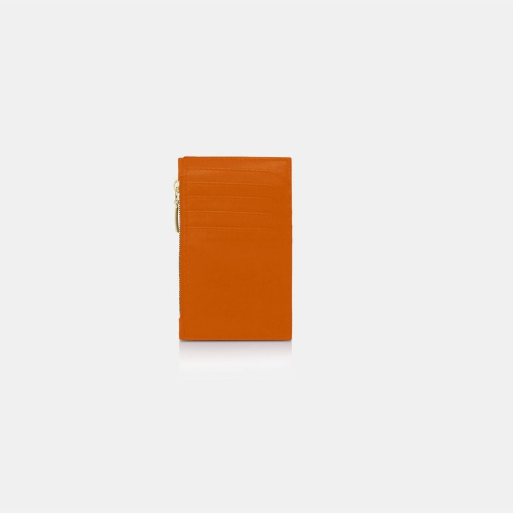 porte carte et porte monnaie en cuir couleur orange collection henri marque louvreuse